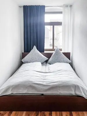 Ein Bett oder Betten in einem Zimmer der Unterkunft Zentrum, 4Personen, privater Parkplatz, WiFi, modern, ruhig
