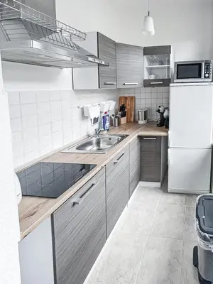 Küche/Küchenzeile in der Unterkunft Zentrum, 4Personen, privater Parkplatz, WiFi, modern, ruhig