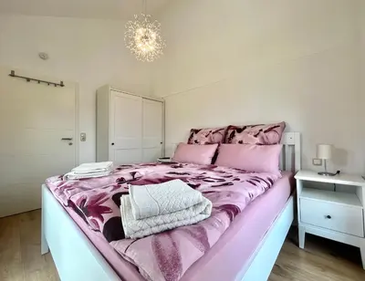 Ein Bett oder Betten in einem Zimmer der Unterkunft Ferienhaus „Am Sandstein“