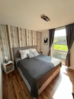 Ein Bett oder Betten in einem Zimmer der Unterkunft Modernes Apartment in Chemnitz
