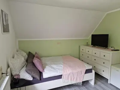 Ein Bett oder Betten in einem Zimmer der Unterkunft Tinyroom mit Ausblick