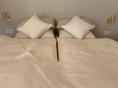 Ein Bett oder Betten in einem Zimmer der Unterkunft Idyllische Fewo Belling Spa - eigene Sauna