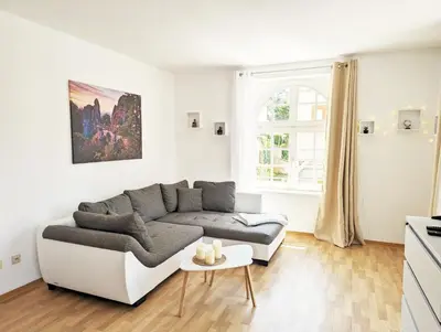 Ein Sitzbereich in der Unterkunft HW1 - Urlaubsmagie - Gemütliche Wohnung mit Saunazugang zum Entspannen