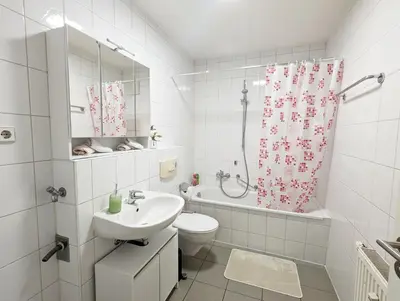 Ein Badezimmer in der Unterkunft HW1 - Urlaubsmagie - Gemütliche Wohnung mit Saunazugang zum Entspannen
