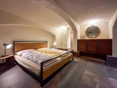 Ein Bett oder Betten in einem Zimmer der Unterkunft Atelier Dresden Neustadt
