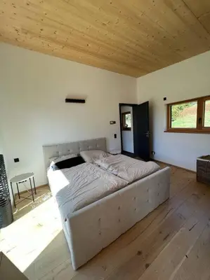 Ein Bett oder Betten in einem Zimmer der Unterkunft Tolle Bergvilla im Osterzgebirge