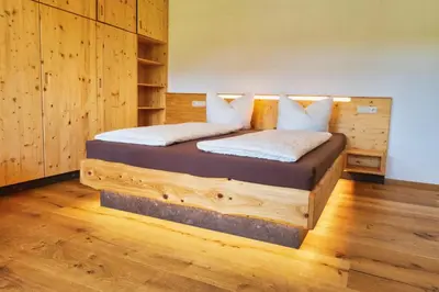 Ein Bett oder Betten in einem Zimmer der Unterkunft Sandsteinidyll