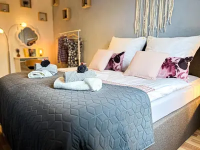 Ein Bett oder Betten in einem Zimmer der Unterkunft Elbling Apartment mit Terrasse - Netflix - Parkplatz - Weinbergblick