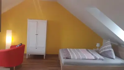 Ein Bett oder Betten in einem Zimmer der Unterkunft Haus am Park Nahe Eilenburg Wurzen