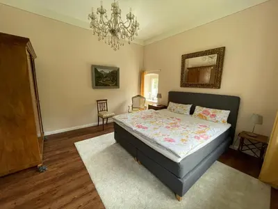 Ein Bett oder Betten in einem Zimmer der Unterkunft Luxuriöse FeWohnung Felsenblick