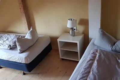 Ein Bett oder Betten in einem Zimmer der Unterkunft Ferienwohnung Salamander