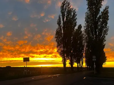 Blick auf den Sonnenuntergang/Sonnenaufgang von der Ferienwohnung aus oder aus der Nähe