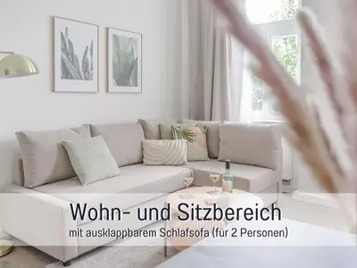 Ein Sitzbereich in der Unterkunft Benville BV01 - Ideal für 4-6 Personen - WLAN, Waschmaschine, Parkplatz - 2 Schlafzimmer - 1 km zum Bahnhof - ruhige Lage