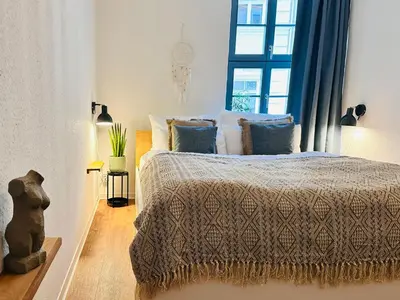 Ein Bett oder Betten in einem Zimmer der Unterkunft Im Herzen der Stadt - mit kostenlosem Parkplatz