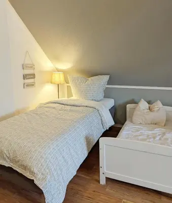 Ein Bett oder Betten in einem Zimmer der Unterkunft Ferienhaus Lausitz