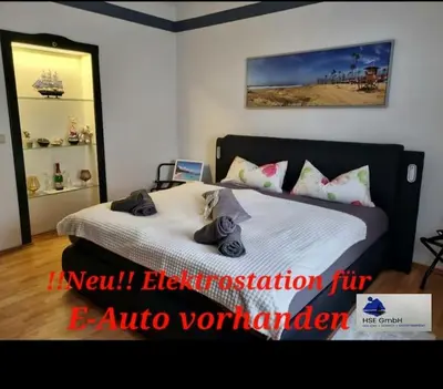 Ein Bett oder Betten in einem Zimmer der Unterkunft Ferienwohnung *Zur Weinbergstraße*
