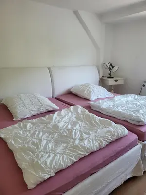 Ein Bett oder Betten in einem Zimmer der Unterkunft Ferienwohnung Elbblick
