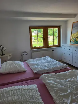 Ein Bett oder Betten in einem Zimmer der Unterkunft Ferienwohnung Elbblick