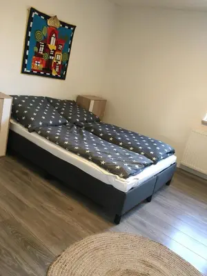 Ein Bett oder Betten in einem Zimmer der Unterkunft Apartment im Stadthaus