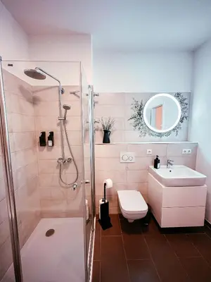 Ein Badezimmer in der Unterkunft Oasis Appart - Wohnen im Königspark - Elbhang Dresden - große Terrasse - Netflix - TG
