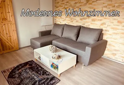 Ein Sitzbereich in der Unterkunft Ferienhaus Lavendel