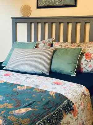 Ein Bett oder Betten in einem Zimmer der Unterkunft Familienfreundliches Landhaus 