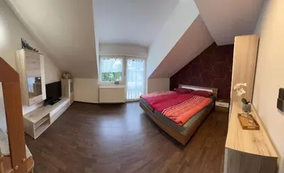 Ein Bett oder Betten in einem Zimmer der Unterkunft Stilvolles Ferienhaus mit Garten für 6 Personen