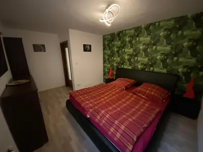 Ein Bett oder Betten in einem Zimmer der Unterkunft Stilvolles Ferienhaus mit Garten für 6 Personen