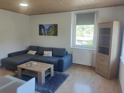Ein Sitzbereich in der Unterkunft Ferienwohnung 2 am Hofladen Hellendorf