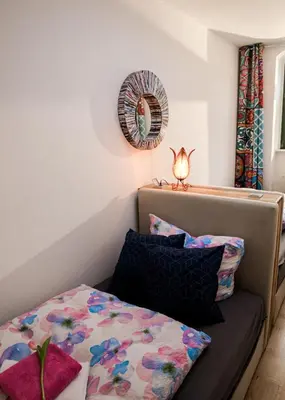 Ein Bett oder Betten in einem Zimmer der Unterkunft Weinberg 100