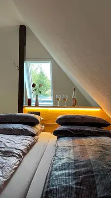 Ein Bett oder Betten in einem Zimmer der Unterkunft Carolinga