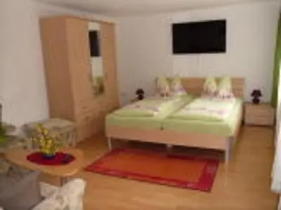 Ein Bett oder Betten in einem Zimmer der Unterkunft Ferienwohnung Dagmar Mergen