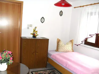 Ein Bett oder Betten in einem Zimmer der Unterkunft Ferienwohnung Dagmar Mergen