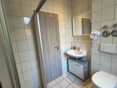 Ein Badezimmer in der Unterkunft Pension Kaditz
