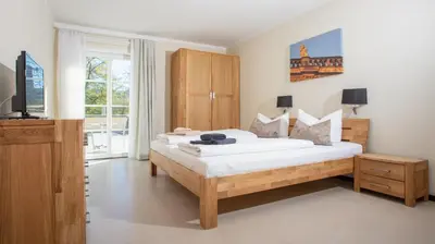 Ein Bett oder Betten in einem Zimmer der Unterkunft Hofgärtnerhaus