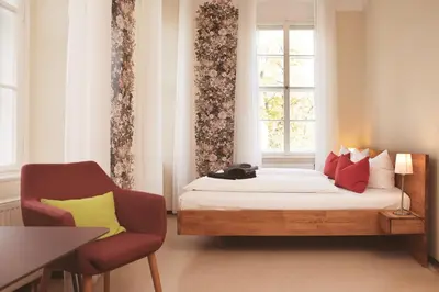 Ein Bett oder Betten in einem Zimmer der Unterkunft Hofgärtnerhaus