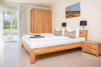 Ein Bett oder Betten in einem Zimmer der Unterkunft Hofgärtnerhaus