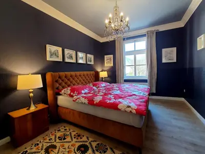 Ein Bett oder Betten in einem Zimmer der Unterkunft ArtHouse Am Kurpark Bad Schandau