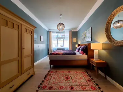 Ein Bett oder Betten in einem Zimmer der Unterkunft ArtHouse Am Kurpark Bad Schandau