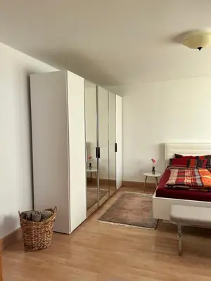 Ein Bett oder Betten in einem Zimmer der Unterkunft Sehr schöne Wohnung,komplett neu eingerichtet