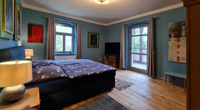 Ein Bett oder Betten in einem Zimmer der Unterkunft ArtHouse Lilienstein