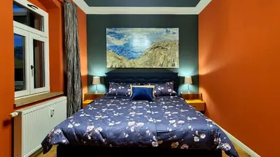 Ein Bett oder Betten in einem Zimmer der Unterkunft ArtHouse Lilienstein