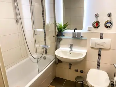 Ein Badezimmer in der Unterkunft Stilvolles 60qm City Apartment Zentrumsnahe 2R