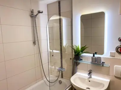 Ein Badezimmer in der Unterkunft Stilvolles 60qm City Apartment Zentrumsnahe 2R