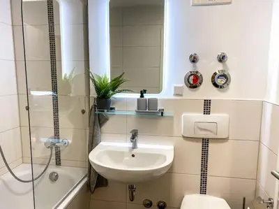 Ein Badezimmer in der Unterkunft Stilvolles 60qm City Apartment Zentrumsnahe 2R