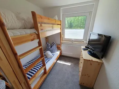 Ein Bett oder Betten in einem Zimmer der Unterkunft Ferienwohnung Wandersruh - Oase der Ruhe am Malerweg und die sächs. Schweiz direkt vor der Haustür