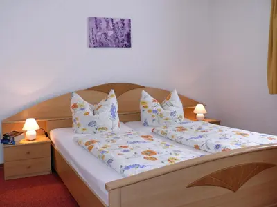 Ein Bett oder Betten in einem Zimmer der Unterkunft Ferienpension Gabriele