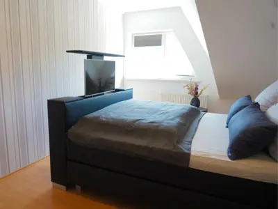 Ein Bett oder Betten in einem Zimmer der Unterkunft Astrids Seehaus