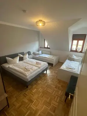 Ein Bett oder Betten in einem Zimmer der Unterkunft GoldigeFerienwohnung 