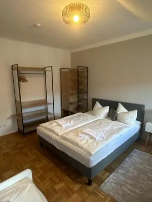 Ein Bett oder Betten in einem Zimmer der Unterkunft GoldigeFerienwohnung 